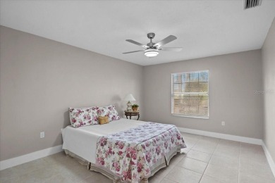 Tucked away among tree-lined streets and mature landscaping in on River Wilderness Golf and Country Club in Florida - for sale on GolfHomes.com, golf home, golf lot