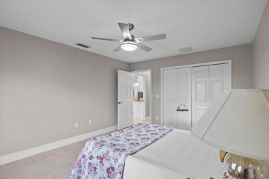 Tucked away among tree-lined streets and mature landscaping in on River Wilderness Golf and Country Club in Florida - for sale on GolfHomes.com, golf home, golf lot