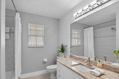 Tucked away among tree-lined streets and mature landscaping in on River Wilderness Golf and Country Club in Florida - for sale on GolfHomes.com, golf home, golf lot