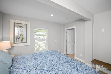 Tucked along one of Orange Beach's most sought-after waterfront on Orange Beach Golf Center in Alabama - for sale on GolfHomes.com, golf home, golf lot