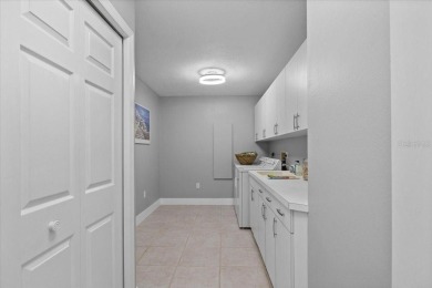 Tucked away among tree-lined streets and mature landscaping in on River Wilderness Golf and Country Club in Florida - for sale on GolfHomes.com, golf home, golf lot
