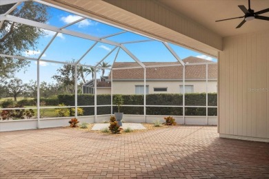 Tucked away among tree-lined streets and mature landscaping in on River Wilderness Golf and Country Club in Florida - for sale on GolfHomes.com, golf home, golf lot