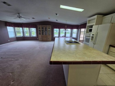 This home is on leased land and is located in a 55+ resort-style on Big Cypress Golf and Country Club in Florida - for sale on GolfHomes.com, golf home, golf lot