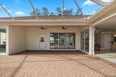 Tucked away among tree-lined streets and mature landscaping in on River Wilderness Golf and Country Club in Florida - for sale on GolfHomes.com, golf home, golf lot