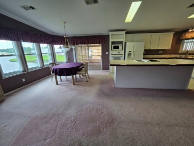 This home is on leased land and is located in a 55+ resort-style on Big Cypress Golf and Country Club in Florida - for sale on GolfHomes.com, golf home, golf lot