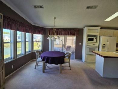 This home is on leased land and is located in a 55+ resort-style on Big Cypress Golf and Country Club in Florida - for sale on GolfHomes.com, golf home, golf lot