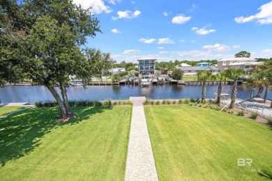 Tucked along one of Orange Beach's most sought-after waterfront on Orange Beach Golf Center in Alabama - for sale on GolfHomes.com, golf home, golf lot