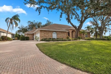 Tucked away among tree-lined streets and mature landscaping in on River Wilderness Golf and Country Club in Florida - for sale on GolfHomes.com, golf home, golf lot