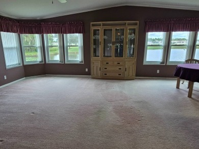 This home is on leased land and is located in a 55+ resort-style on Big Cypress Golf and Country Club in Florida - for sale on GolfHomes.com, golf home, golf lot