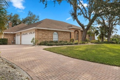 Tucked away among tree-lined streets and mature landscaping in on River Wilderness Golf and Country Club in Florida - for sale on GolfHomes.com, golf home, golf lot