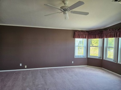 This home is on leased land and is located in a 55+ resort-style on Big Cypress Golf and Country Club in Florida - for sale on GolfHomes.com, golf home, golf lot