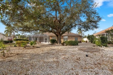 Tucked away among tree-lined streets and mature landscaping in on River Wilderness Golf and Country Club in Florida - for sale on GolfHomes.com, golf home, golf lot