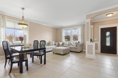 This very spacious 5-bedroom home, situated on a premium, fenced on Carillon Lakes 3 Hole Course in Illinois - for sale on GolfHomes.com, golf home, golf lot