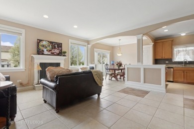 This very spacious 5-bedroom home, situated on a premium, fenced on Carillon Lakes 3 Hole Course in Illinois - for sale on GolfHomes.com, golf home, golf lot