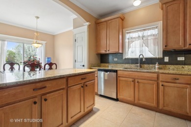 This very spacious 5-bedroom home, situated on a premium, fenced on Carillon Lakes 3 Hole Course in Illinois - for sale on GolfHomes.com, golf home, golf lot
