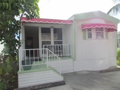 Come live the Florida lifestyle in this cozy, 1 bedroom, 1.5 on Island Dunes Country Club in Florida - for sale on GolfHomes.com, golf home, golf lot