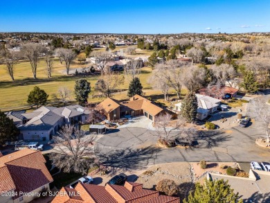 Nestled on fairway 7 of the San Juan Country Club, in Farmington on San Juan Country Club in New Mexico - for sale on GolfHomes.com, golf home, golf lot