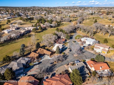 Nestled on fairway 7 of the San Juan Country Club, in Farmington on San Juan Country Club in New Mexico - for sale on GolfHomes.com, golf home, golf lot