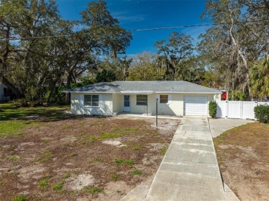 Embrace the essence of living the Florida Dream in this stunning on The Dunedin Country Club in Florida - for sale on GolfHomes.com, golf home, golf lot