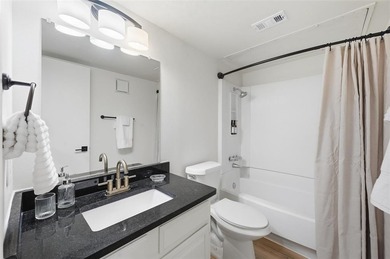 Welcome to this beautifully updated condo nestled in a serene on Stevens Park Golf Course in Texas - for sale on GolfHomes.com, golf home, golf lot