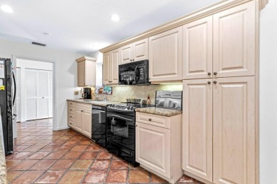 This spacious 2,494 square foot villa offers sweeping golf on Hunters Run Golf and Country Club in Florida - for sale on GolfHomes.com, golf home, golf lot