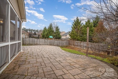 This stunning home is filled with natural light, highlighting on Highland Creek Golf Club in North Carolina - for sale on GolfHomes.com, golf home, golf lot