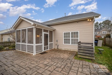 This stunning home is filled with natural light, highlighting on Highland Creek Golf Club in North Carolina - for sale on GolfHomes.com, golf home, golf lot