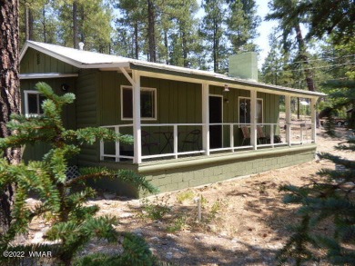 It's the cutest little cabin ever. Backs to USFS & front yard on Alpine Country Club in Arizona - for sale on GolfHomes.com, golf home, golf lot