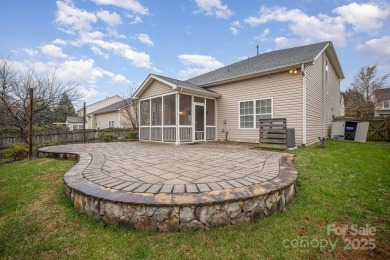 This stunning home is filled with natural light, highlighting on Highland Creek Golf Club in North Carolina - for sale on GolfHomes.com, golf home, golf lot