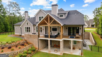 From the moment you arrive, the welcoming charm of the expansive on Coweta Club in Georgia - for sale on GolfHomes.com, golf home, golf lot