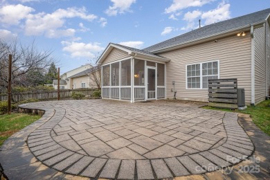 This stunning home is filled with natural light, highlighting on Highland Creek Golf Club in North Carolina - for sale on GolfHomes.com, golf home, golf lot