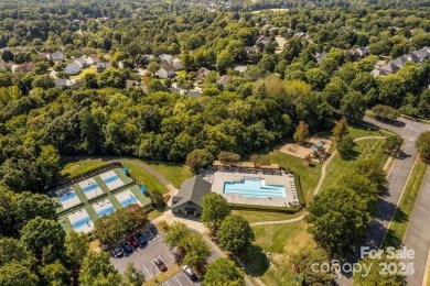 This stunning home is filled with natural light, highlighting on Highland Creek Golf Club in North Carolina - for sale on GolfHomes.com, golf home, golf lot