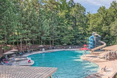 This stunning home is filled with natural light, highlighting on Highland Creek Golf Club in North Carolina - for sale on GolfHomes.com, golf home, golf lot