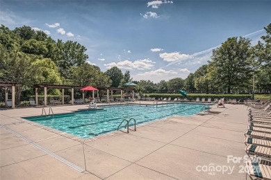 This stunning home is filled with natural light, highlighting on Highland Creek Golf Club in North Carolina - for sale on GolfHomes.com, golf home, golf lot