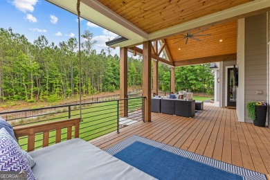 From the moment you arrive, the welcoming charm of the expansive on Coweta Club in Georgia - for sale on GolfHomes.com, golf home, golf lot