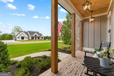 From the moment you arrive, the welcoming charm of the expansive on Coweta Club in Georgia - for sale on GolfHomes.com, golf home, golf lot