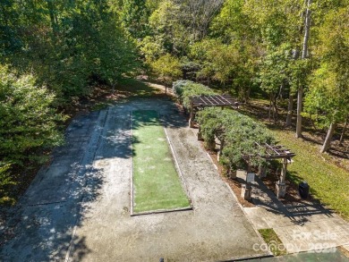 This stunning home is filled with natural light, highlighting on Highland Creek Golf Club in North Carolina - for sale on GolfHomes.com, golf home, golf lot