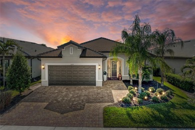 Discover the highly sought-after Martin Ray model with private on Sarasota National Golf Club in Florida - for sale on GolfHomes.com, golf home, golf lot