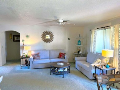 Nestled on a cozy corner lot, this spacious 2 bedroom 2 bath on Mesa Del Sol Golf Club in Arizona - for sale on GolfHomes.com, golf home, golf lot