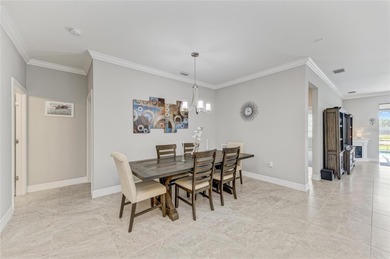 Discover the highly sought-after Martin Ray model with private on Sarasota National Golf Club in Florida - for sale on GolfHomes.com, golf home, golf lot