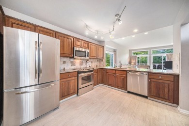 Stonebridge Golfing Community, Sharp Ranch Condo overlooking the on Stonebridge Golf Club in Michigan - for sale on GolfHomes.com, golf home, golf lot