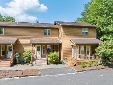 Located in a secure, gated golf course community, this 2-bedroom on Smoky Mountain Country Club in North Carolina - for sale on GolfHomes.com, golf home, golf lot