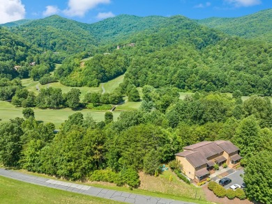Located in a secure, gated golf course community, this 2-bedroom on Smoky Mountain Country Club in North Carolina - for sale on GolfHomes.com, golf home, golf lot