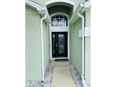 Step into radiant Florida living in the coveted Golf community on Wedgefield Golf Club in Florida - for sale on GolfHomes.com, golf home, golf lot