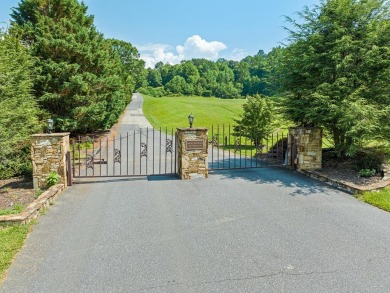 Located in a secure, gated golf course community, this 2-bedroom on Smoky Mountain Country Club in North Carolina - for sale on GolfHomes.com, golf home, golf lot