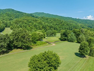 Located in a secure, gated golf course community, this 2-bedroom on Smoky Mountain Country Club in North Carolina - for sale on GolfHomes.com, golf home, golf lot