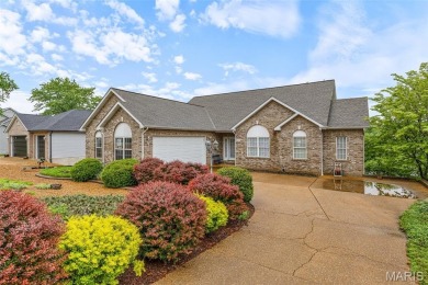 Welcome to your dream lakefront escape--a rare opportunity to on Raintree Country Club in Missouri - for sale on GolfHomes.com, golf home, golf lot
