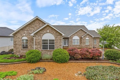 Welcome to your dream lakefront escape--a rare opportunity to on Raintree Country Club in Missouri - for sale on GolfHomes.com, golf home, golf lot