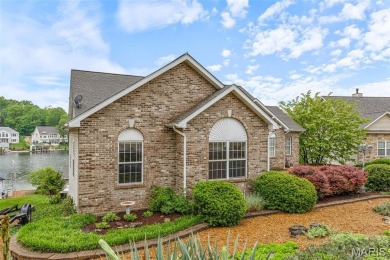 Welcome to your dream lakefront escape--a rare opportunity to on Raintree Country Club in Missouri - for sale on GolfHomes.com, golf home, golf lot