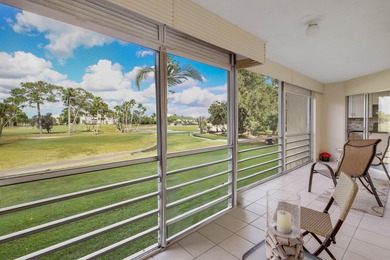 WELCOME TO THIS SPARKLING CONDO WITH EXPANSIVE GOLF VIEWS FROM A on Poinciana Golf Club in Florida - for sale on GolfHomes.com, golf home, golf lot